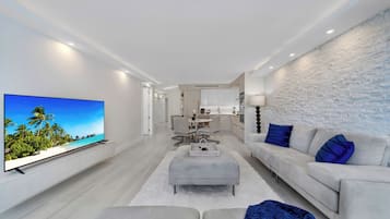 Apartment, 2 Bedrooms | Living area | 55-inch TV with digital channels, Netflix, streaming services