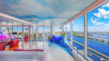 Design Apartment, 2 Bedrooms, Bay View | Living area | 55-inch TV with digital channels, Netflix, streaming services