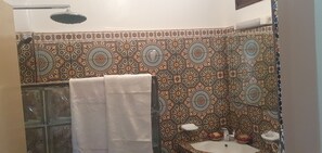 Shower, towels, soap, shampoo