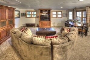 TV, fireplace - The Cove at Lake Burton -  Vintage Lakefront Home with Covered Boathouse Deck (Clarkesville)