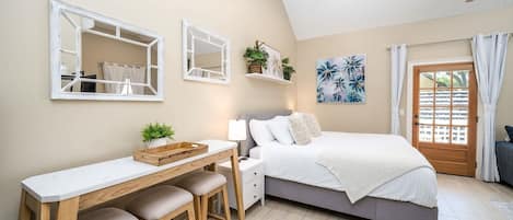 Tabla de planchar con plancha, wifi y ropa de cama