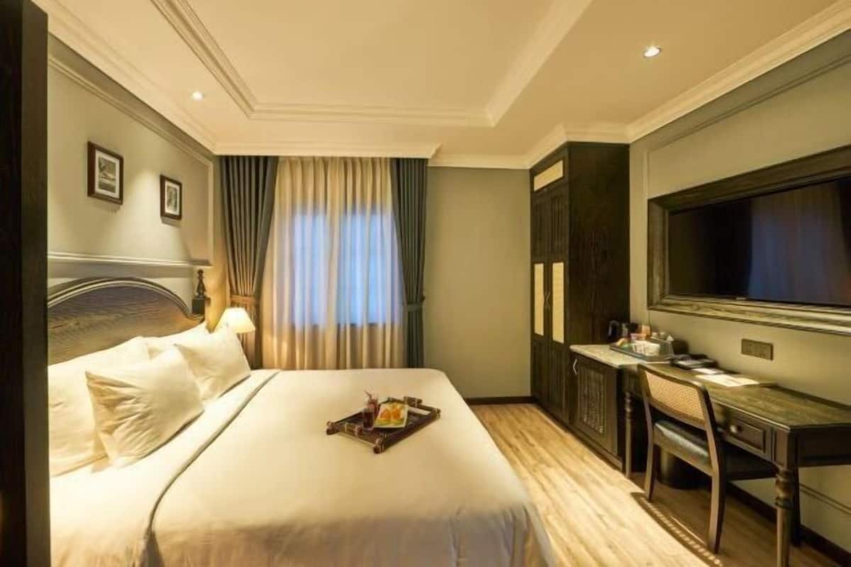 Premium bedding, down duvets, memory-foam beds, in-room safe