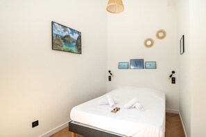 2 dormitorios, tabla de planchar con plancha, wifi gratis y ropa de cama