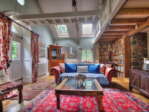 Fireplace - Llyn Peninsula historic holiday cottage, a restored 18th century longhouse. (Garndolbenmaen, near Porthmadog)
