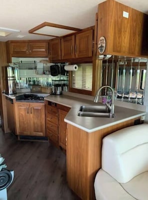 Fridge, microwave, stovetop, coffee/tea maker