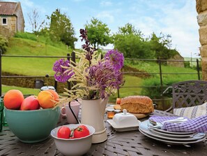 Outdoor dining - Two bedroom cottage packed with character with stone floors and wood burner. (Hawnby, near Helmsley)