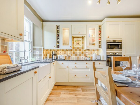 Dishwasher, highchair, cookware/dishes/utensils
