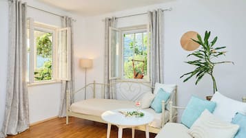 House (2 Bedrooms) | Living room | Flat-screen TV