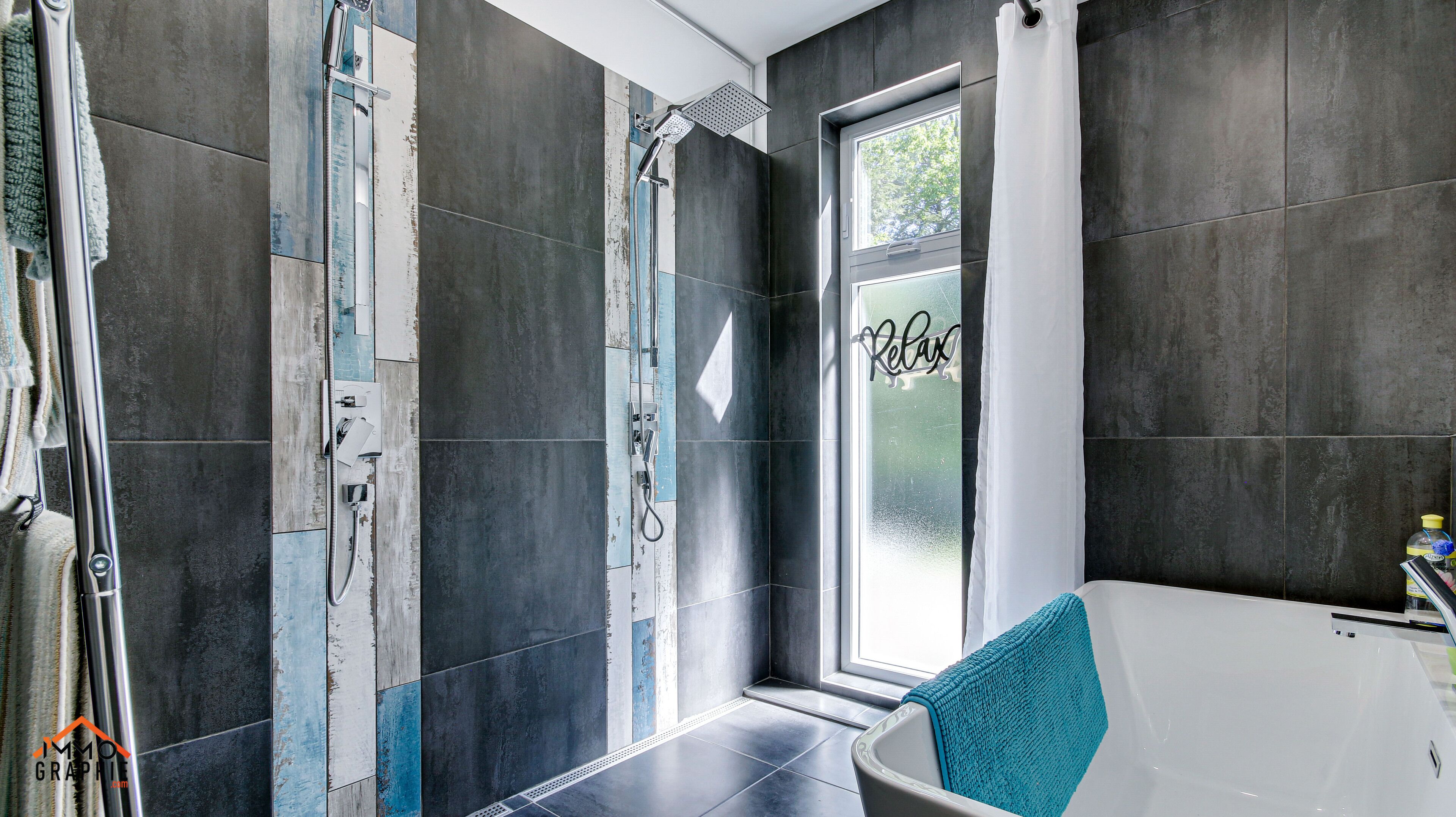 Bathtub, hair dryer, towels, soap