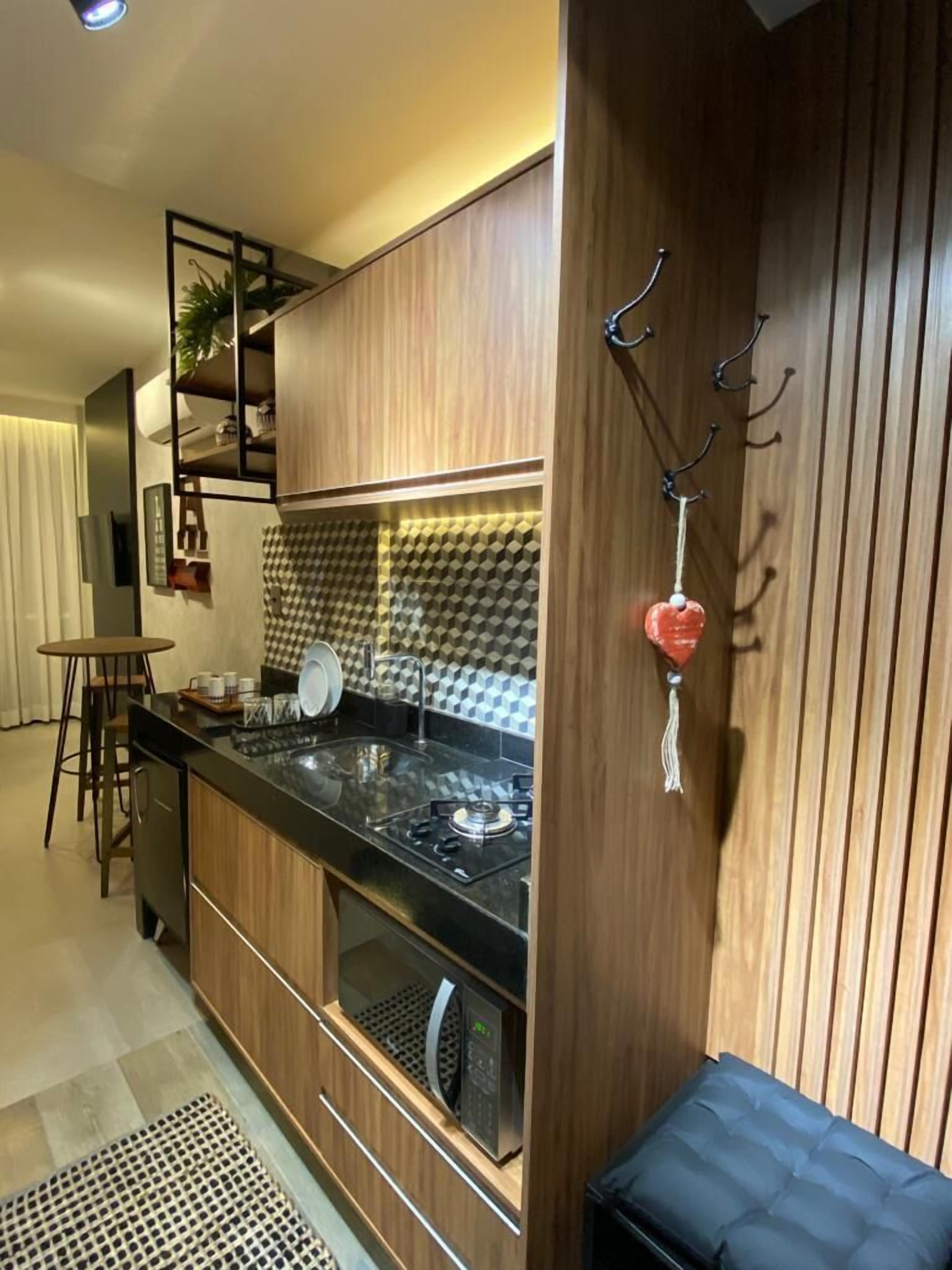 Deluxe Studio Suite, Sea View | Living area | 40-inch Smart TV with satellite channels, TV, Netflix