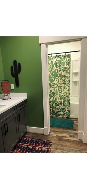 Combined shower/tub, hair dryer, towels, soap