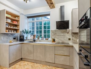 Dishwasher, high chair, cookware/dishes/utensils