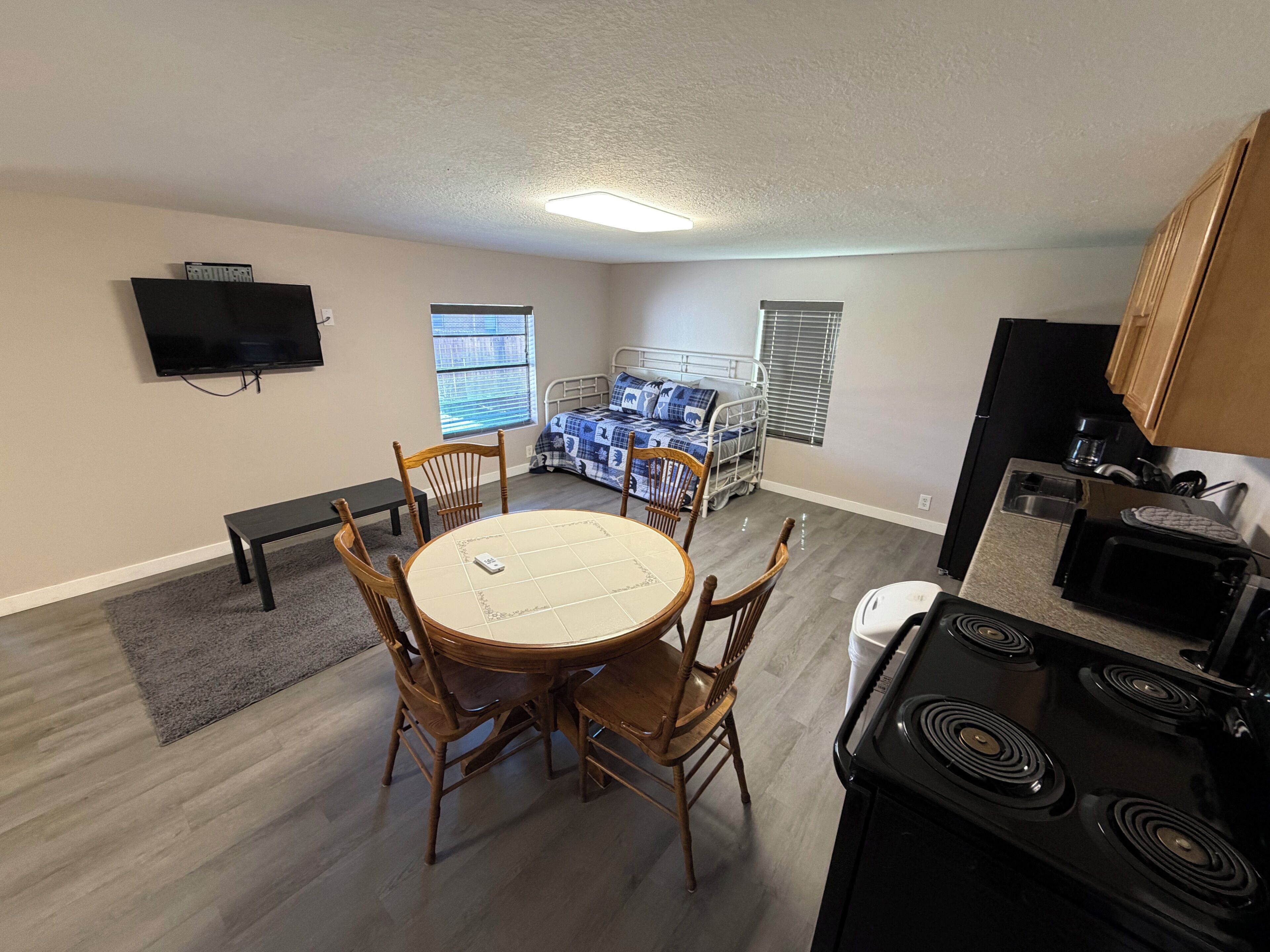 Queen with Day Bed Studio Apartment | Individually decorated, individually furnished, free WiFi, bed sheets