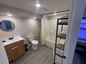 Queen with Day Bed Studio Apartment | Bathroom | Combined shower/tub, free toiletries, hair dryer, towels