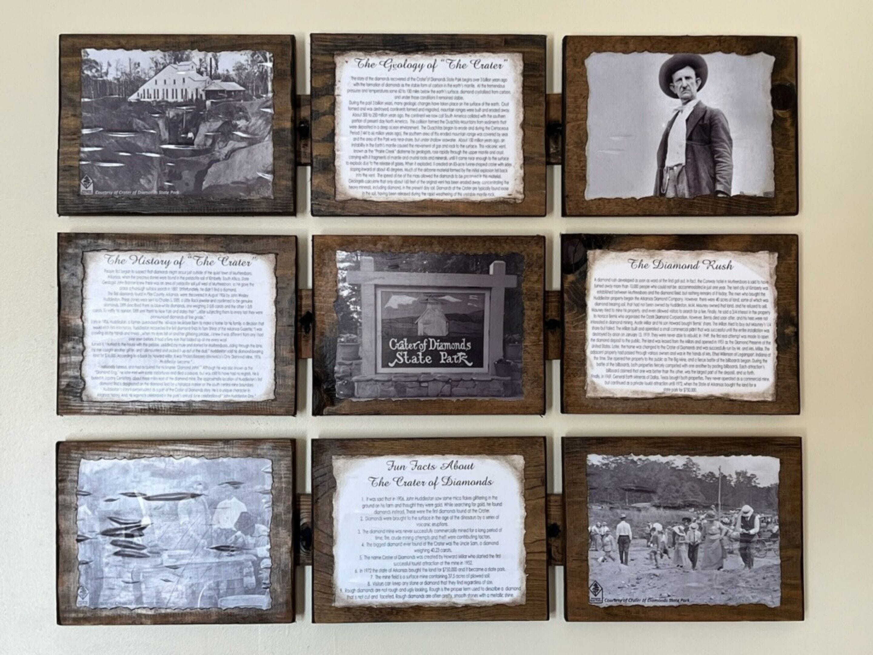 A display of historical documents and photographs related to the Crater of Diamonds State Park.