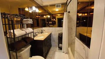 Combined shower/tub, hair dryer, towels, soap