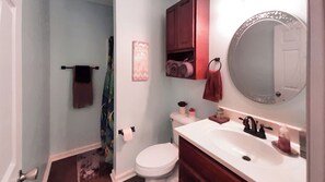 Shower, towels, soap, toilet paper