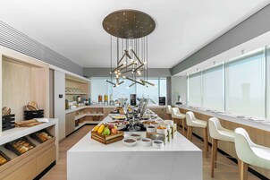 Daily buffet breakfast (USD 18 per person)