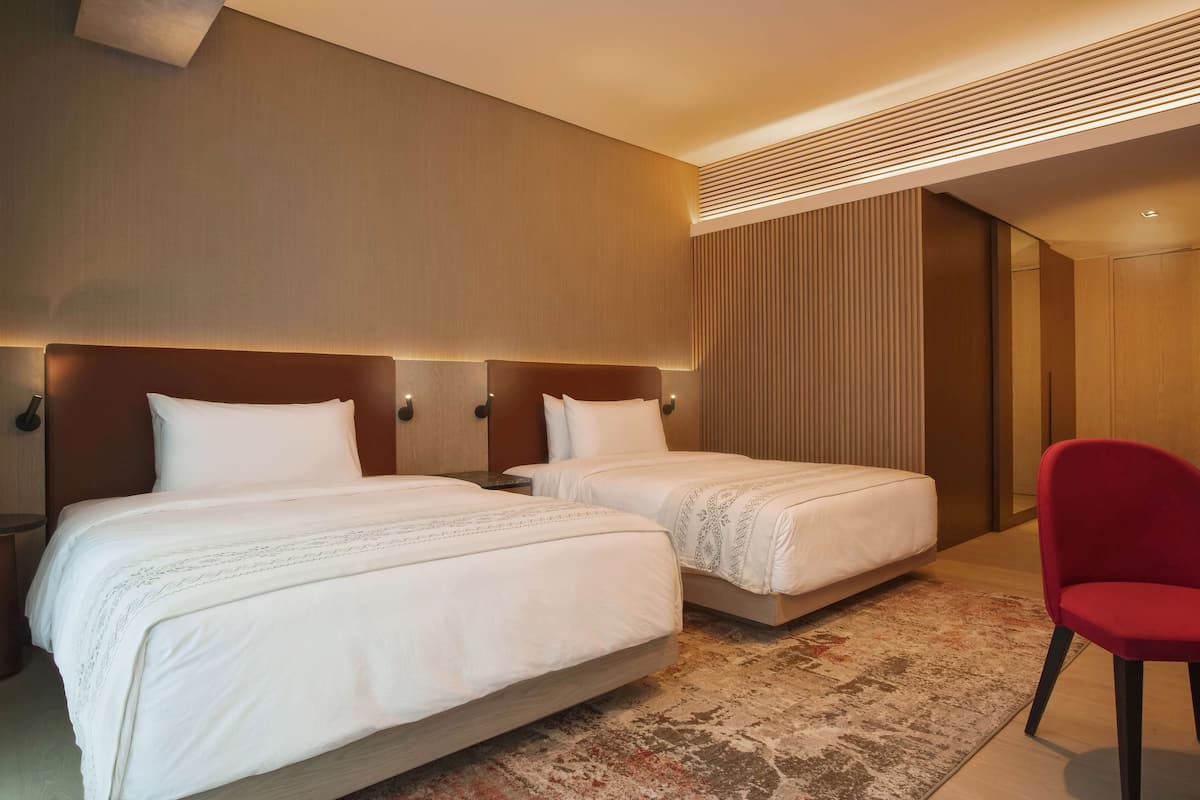1 chambre, couette en duvet d'oie, surmatelas, minibar