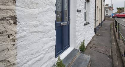 A cosy coastal cottage, offering a beautiful retreat for two.