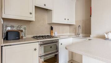 Fridge, microwave, oven, dining tables