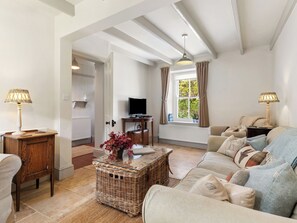 TV, fireplace - A beautifully renovated classic Pembrokeshire cottage with original charm. (Solva, Haverfordwest)