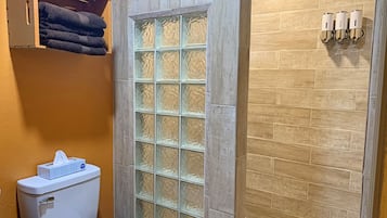 Shower, hair dryer, towels, soap
