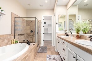 Bathtub, jetted tub, hair dryer, towels