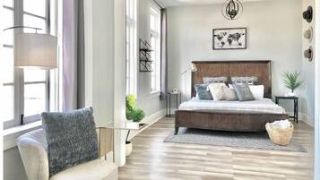 1 bedroom, desk, iron/ironing board, travel crib