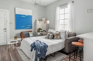 1 bedroom, desk, iron/ironing board, travel crib