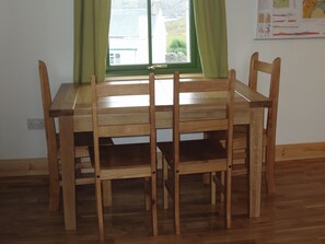 Dining - A pretty detached single storey cottage set in its own grounds. (Achnacarnin near Lochinver)