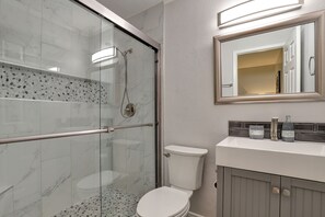 Shower, towels, toilet paper