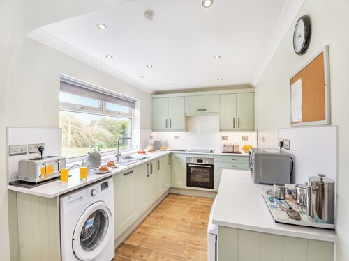 Attached cottage tucked down a pretty lane only a short drive from Pwllheli.