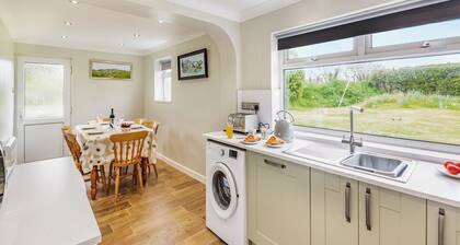 Attached cottage tucked down a pretty lane only a short drive from Pwllheli.