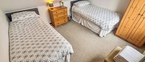 2 habitaciones, wifi gratis y ropa de cama