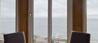 Second floor flat commanding spectacular view across the Firth of Clyde.