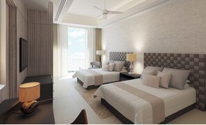 Two single beds with matching headboards, a flat-screen TV, and a desk with a lamp.