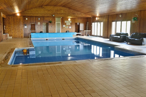Large indoor heated swimming pool | Sherrill Farm Holiday Cottages, Dunterton, near Tavistock