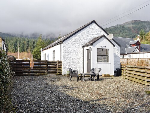 Detached cottage on the banks of Loch Long and the Firth of Clyde near Dunoon.