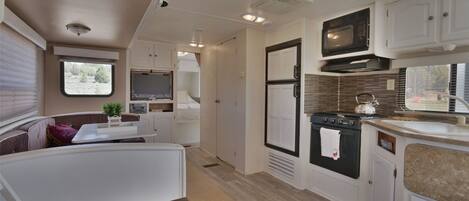 Fridge, microwave, stovetop, coffee/tea maker