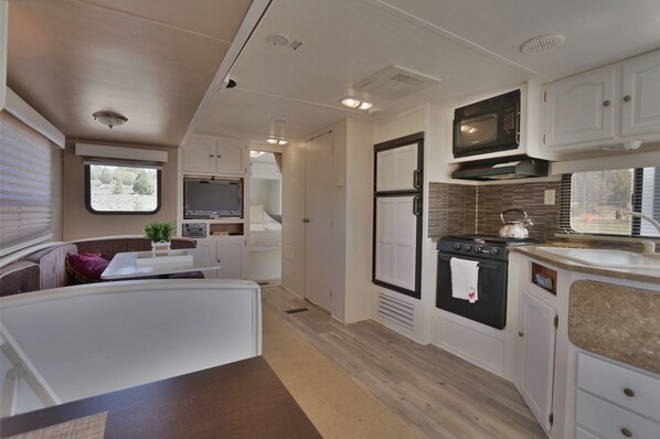 Fridge, microwave, stovetop, coffee/tea maker