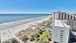 A beachfront hotel with a pool, beach access, and a view of the ocean. - Beautiful Ocean Views, on 15th floor! (Myrtle Beach)