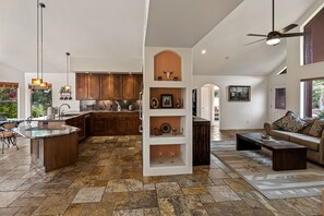 Enjoy a spacious interior with a modern kitchen and comfortable seating area.