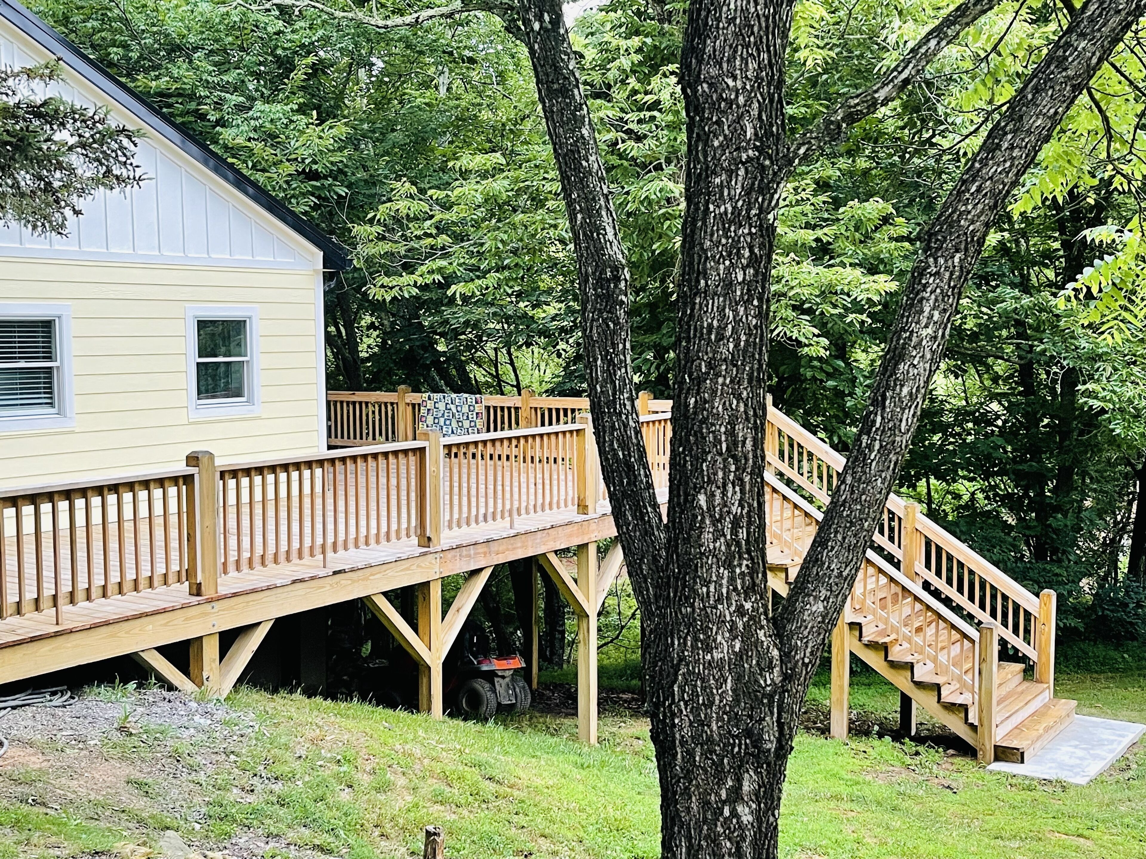 Large outdoor deck with gazebo and firepit