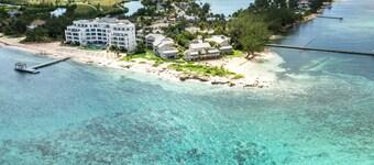 Oceanfront right next to RumPoint, tranquility,pool,gym,tennis court and sunsets