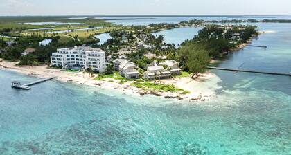 Oceanfront right next to RumPoint, tranquility,pool,gym,tennis court and sunsets