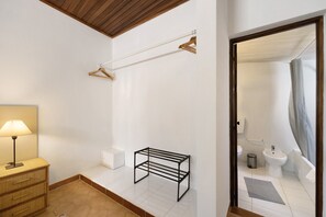 A bathroom with a toilet, bidet, and shower curtain. - Apartment 'A Cerca - A' close to the Beach with Shared Pool & Wi-Fi (Lagos)