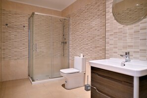 Bathtub, hair dryer, towels