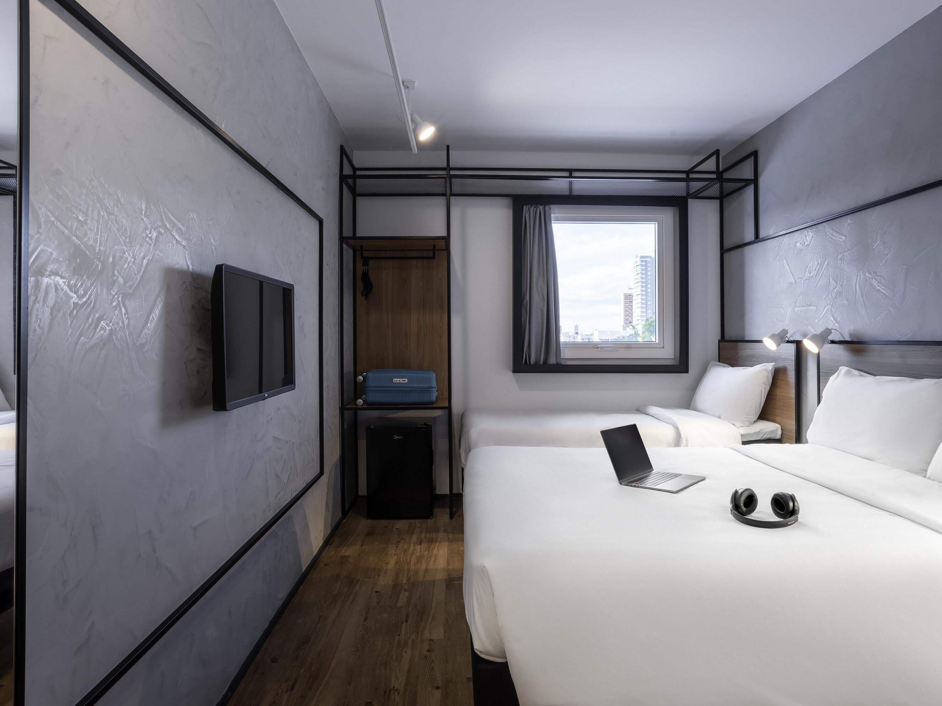 Standard Room, Multiple Beds | Minibar, blackout curtains, soundproofing, free WiFi