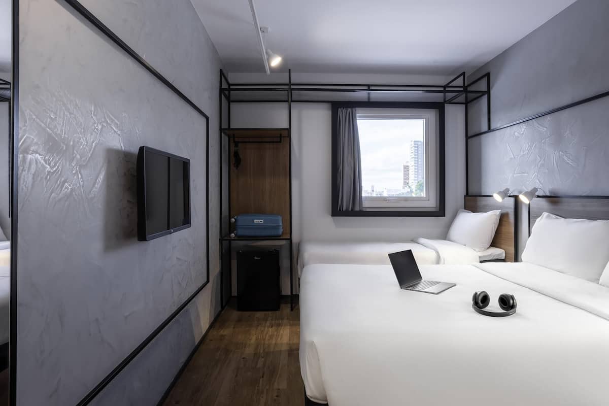 Standard Room, Multiple Beds | Minibar, blackout curtains, soundproofing, free WiFi